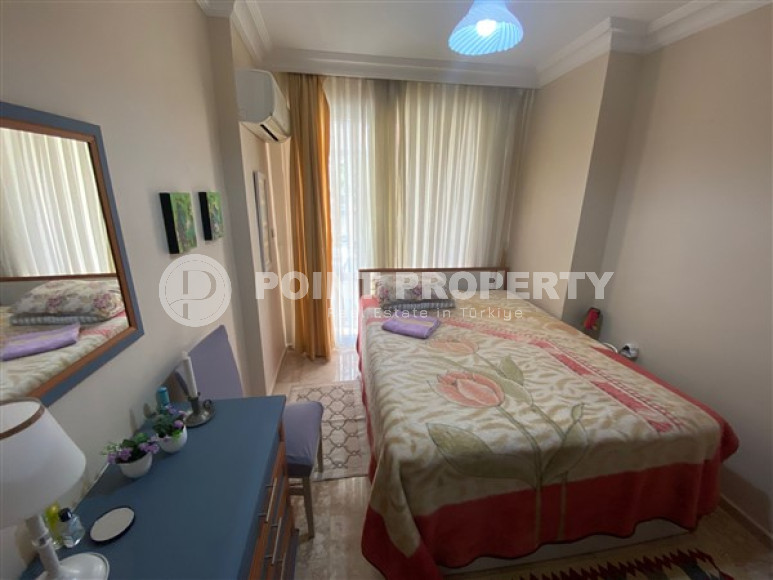 Апартаменты с тремя спальнями в районе Махмутлар, Алания-id-2347-фото-9