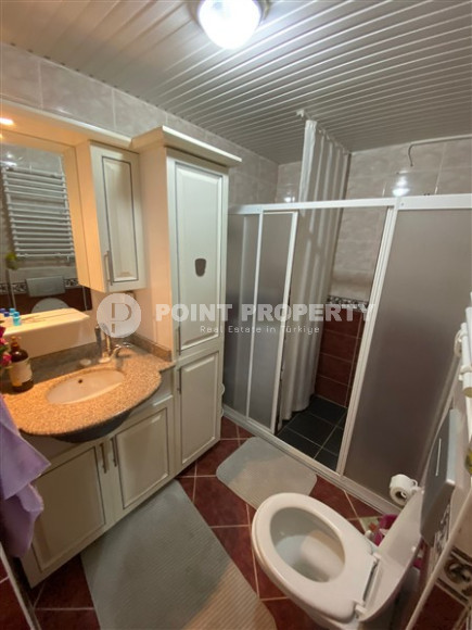 Апартаменты с тремя спальнями в районе Махмутлар, Алания-id-2347-фото-14