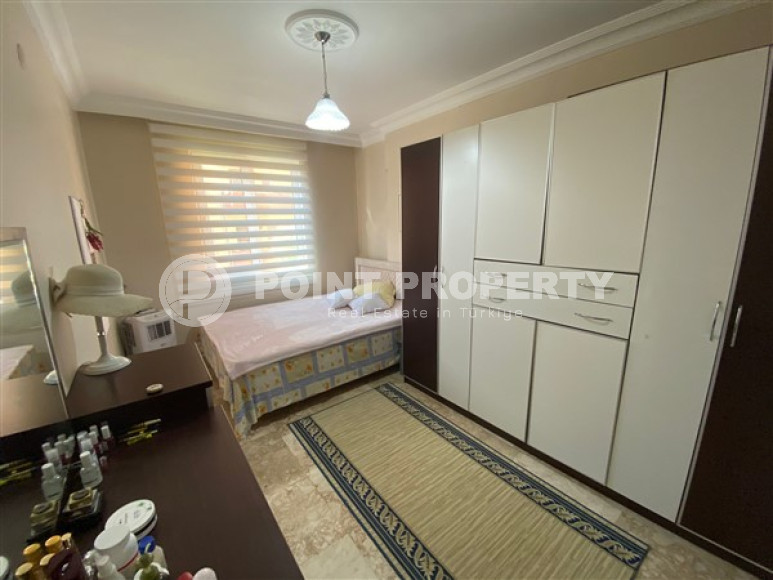 Апартаменты с тремя спальнями в районе Махмутлар, Алания-id-2347-фото-16