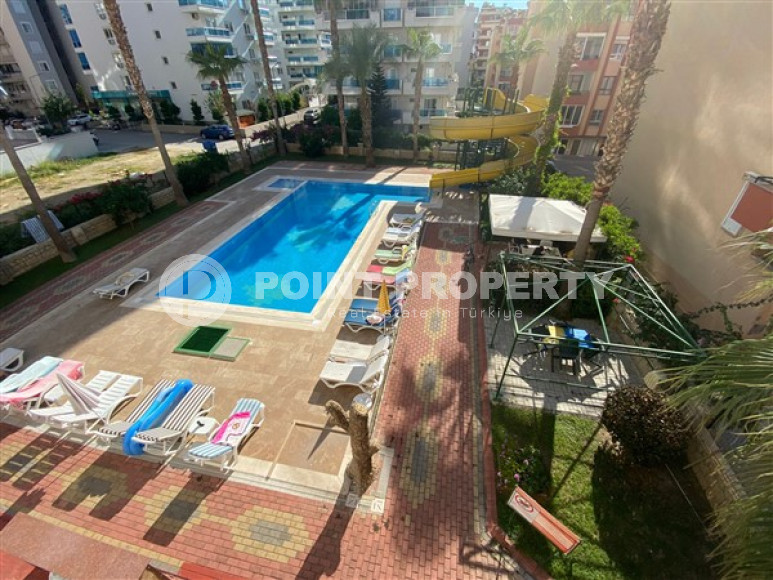 Апартаменты с тремя спальнями в районе Махмутлар, Алания-id-2347-фото-22