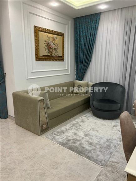 Элитная квартира 2+1, 122м², в комплексе премиум класса на первой береговой линии в Махмутларе, Аланья.-id-2352-фото-1