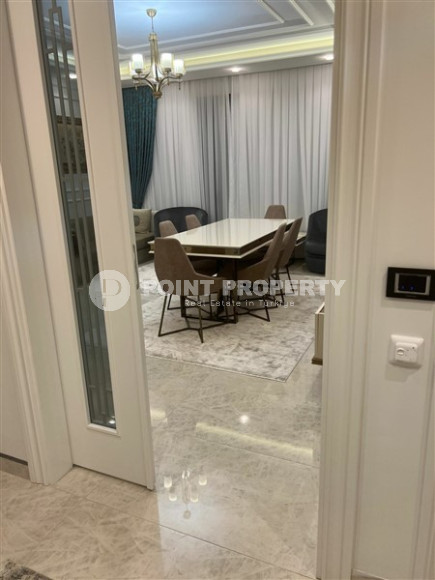 Элитная квартира 2+1, 122м², в комплексе премиум класса на первой береговой линии в Махмутларе, Аланья.-id-2352-фото-2