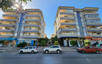 Resale property in the Oba area: furnished apartment 2+1, 125m², in a residence with a swimming pool.-id-2354-photo-1