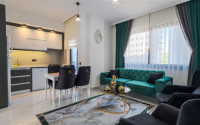 Уютная квартира с одной спальней, 55м², в новом комплексе с инфраструктурой в Махмутларе, Алания-id-2355-фото-1