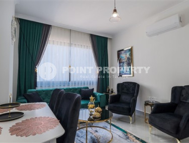 Уютная квартира с одной спальней, 55м², в новом комплексе с инфраструктурой в Махмутларе, Алания-id-2355-фото-2