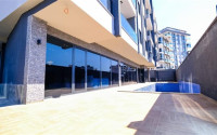 Уютная квартира с одной спальней, 55м², в новом комплексе с инфраструктурой в Махмутларе, Алания-id-2355-фото-12