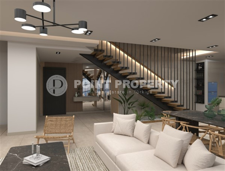 Новая двухкомнатная квартира, 55м², в комплексе на этапе строительства в 800м от моря, Аланья, Каргыджак-id-2358-фото-2