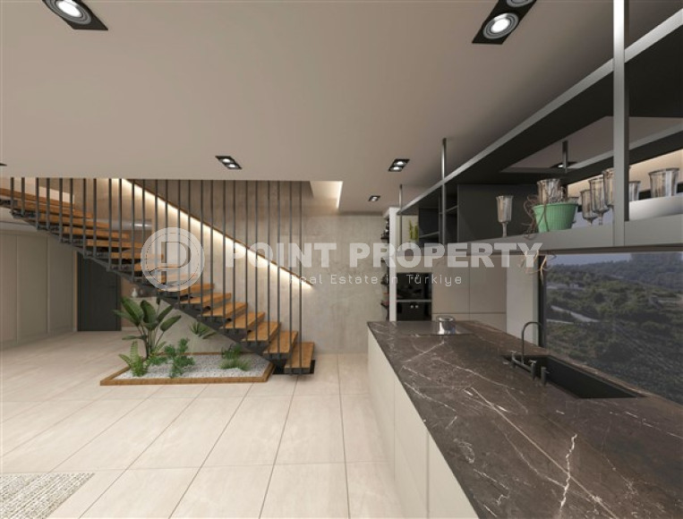 Новая двухкомнатная квартира, 55м², в комплексе на этапе строительства в 800м от моря, Аланья, Каргыджак-id-2358-фото-6