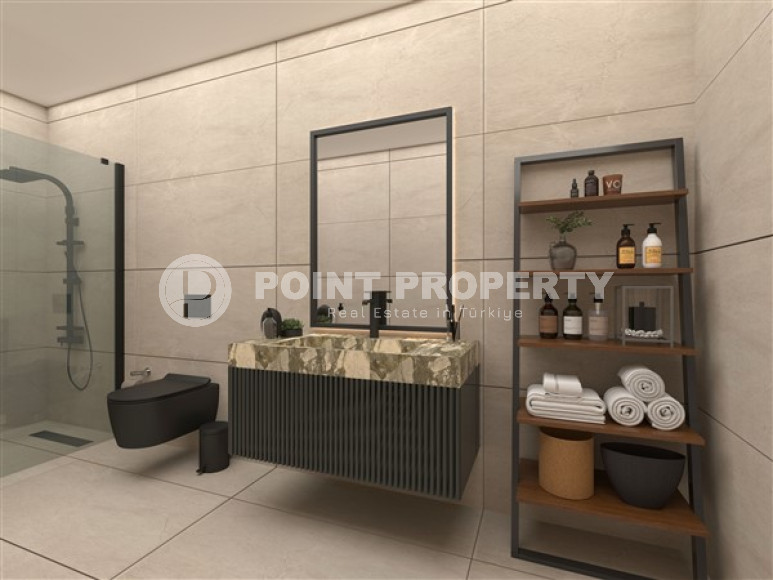 Новая двухкомнатная квартира, 55м², в комплексе на этапе строительства в 800м от моря, Аланья, Каргыджак-id-2358-фото-8