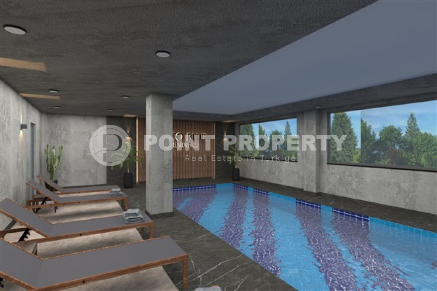 Новая двухкомнатная квартира, 55м², в комплексе на этапе строительства в 800м от моря, Аланья, Каргыджак-id-2358-фото-15