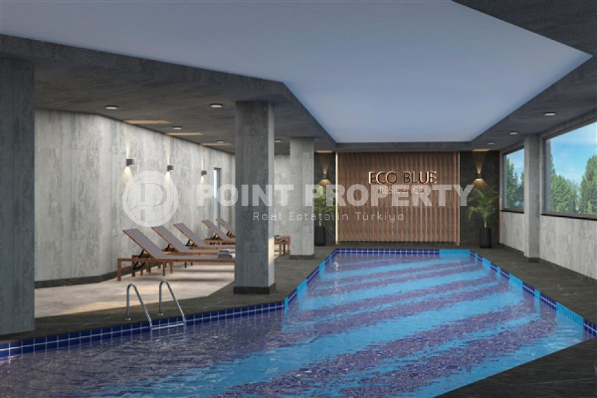 Новая двухкомнатная квартира, 55м², в комплексе на этапе строительства в 800м от моря, Аланья, Каргыджак-id-2358-фото-19