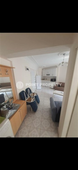 Недорогая вторичная недвижимость: квартира с одной спальней, 65м², в 250м от моря, в Махмутларе-id-2370-фото-5