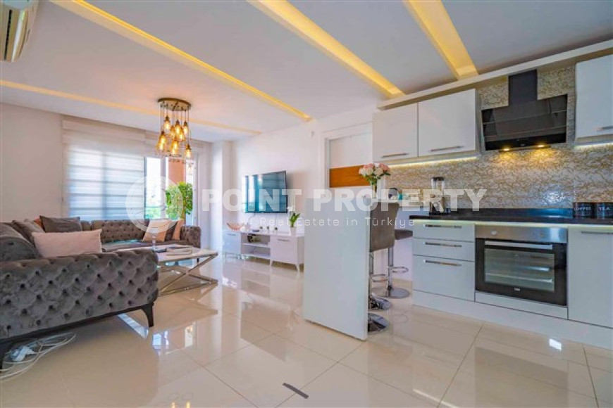 Меблированная квартира с двумя спальнями, 97м², в комплексе с инфраструктурой в центре Алании-id-2373-фото-2