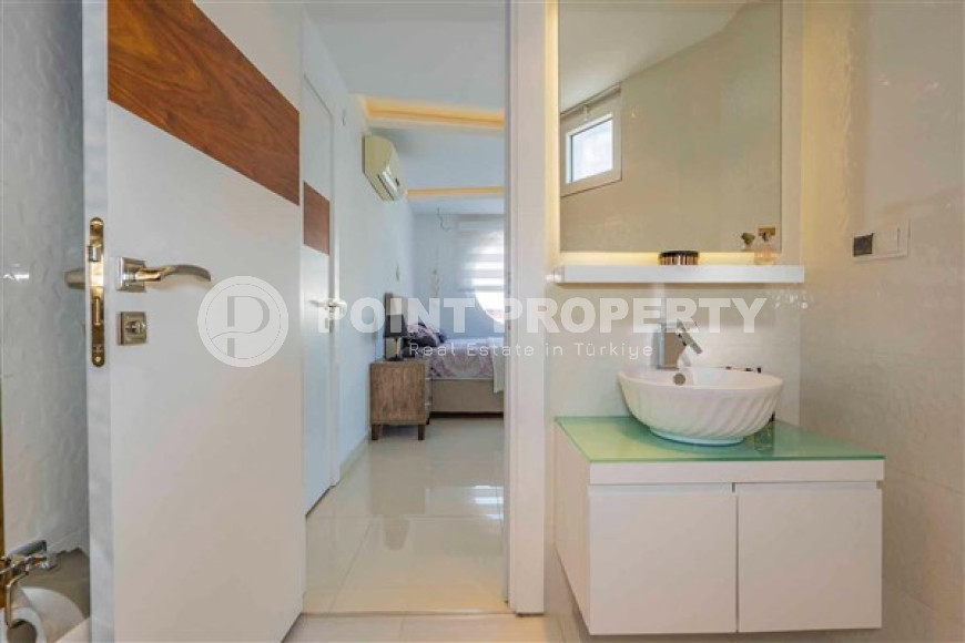 Меблированная квартира с двумя спальнями, 97м², в комплексе с инфраструктурой в центре Алании-id-2373-фото-9