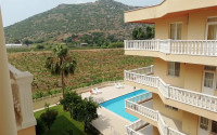 Four-room apartment, 120m², in a residence with a swimming pool in the center of Gazipasa, Alanya-id-2376-photo-4