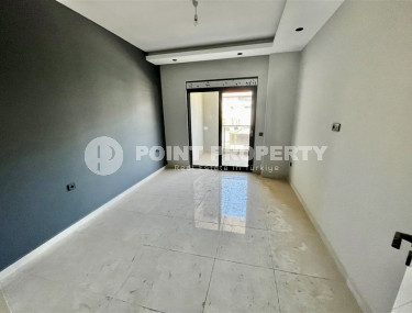 Cozy two-room apartment 1+1 with an area of 52 m2 in a modern residential complex with a private pool in Oba, Alanya-id-1202-photo-5