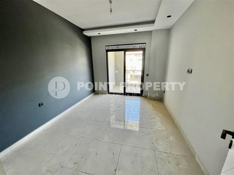 Cozy two-room apartment 1+1 with an area of 52 m2 in a modern residential complex with a private pool in Oba, Alanya-id-1202-photo-5