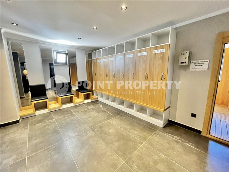 Cozy two-room apartment 1+1 with an area of 52 m2 in a modern residential complex with a private pool in Oba, Alanya-id-1202-photo-6