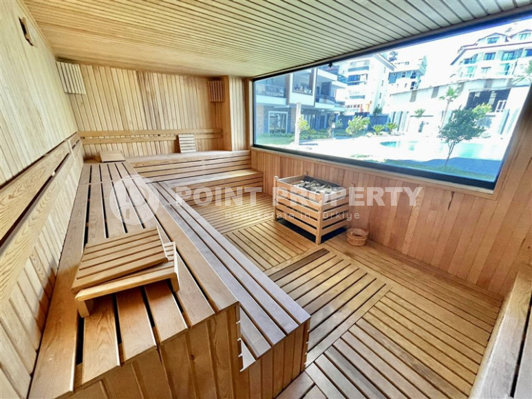 Cozy two-room apartment 1+1 with an area of 52 m2 in a modern residential complex with a private pool in Oba, Alanya-id-1202-photo-8