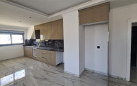 Three bedroom penthouse, 120m², in a residence in the final stage of construction in the Gazipasa area-id-2380-photo-3