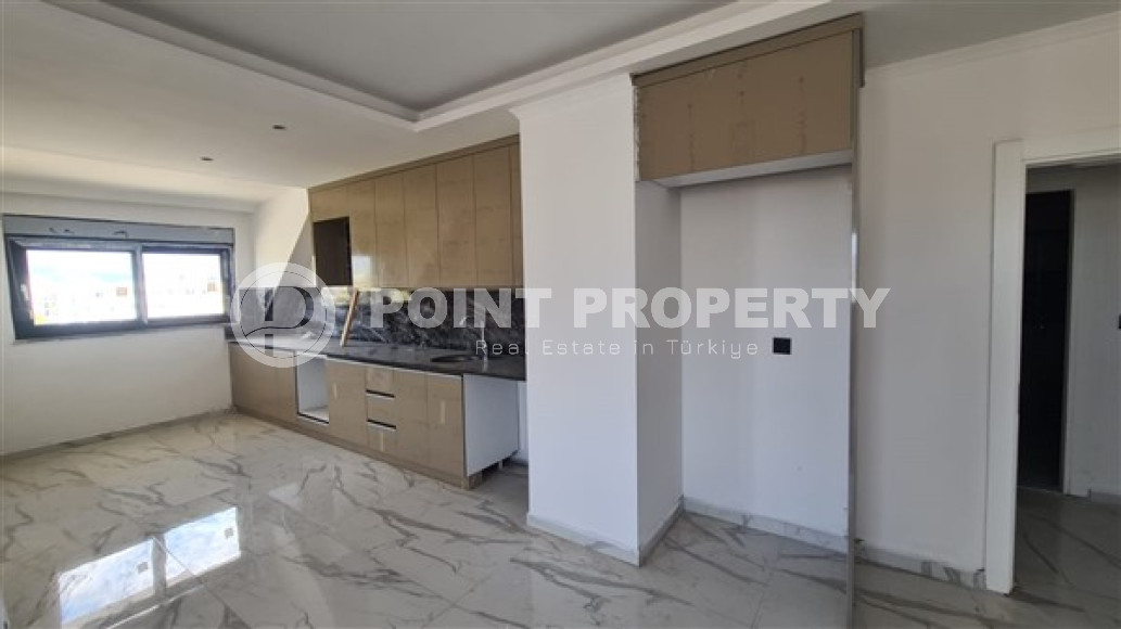 Three bedroom penthouse, 120m², in a residence in the final stage of construction in the Gazipasa area-id-2380-photo-3