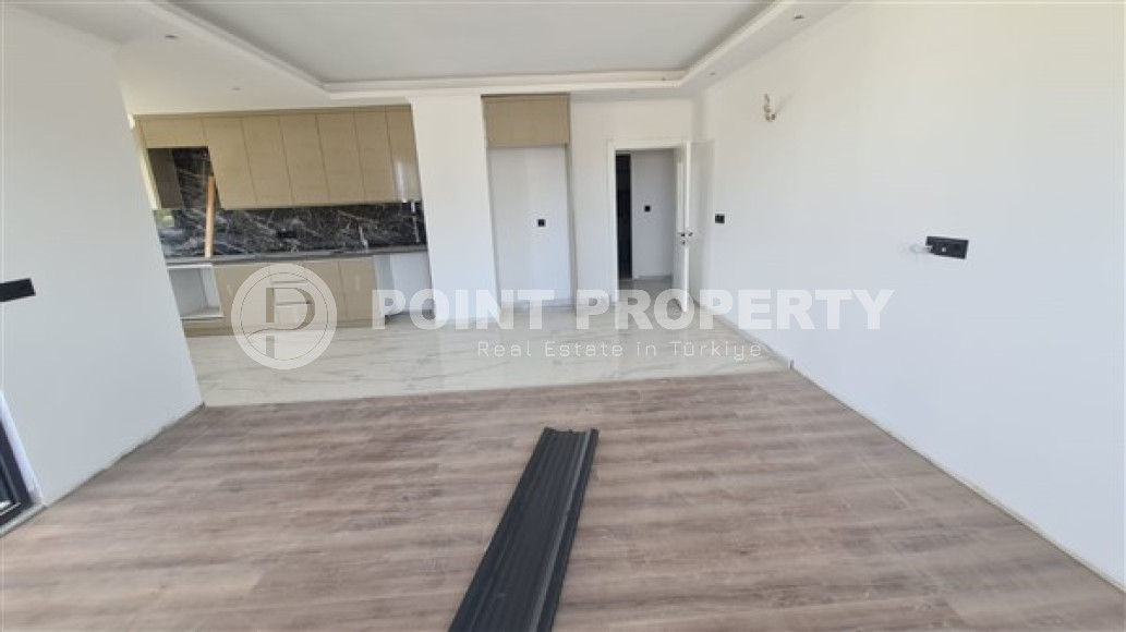 Three bedroom penthouse, 120m², in a residence in the final stage of construction in the Gazipasa area-id-2380-photo-4