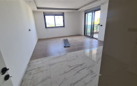 Three bedroom penthouse, 120m², in a residence in the final stage of construction in the Gazipasa area-id-2380-photo-5