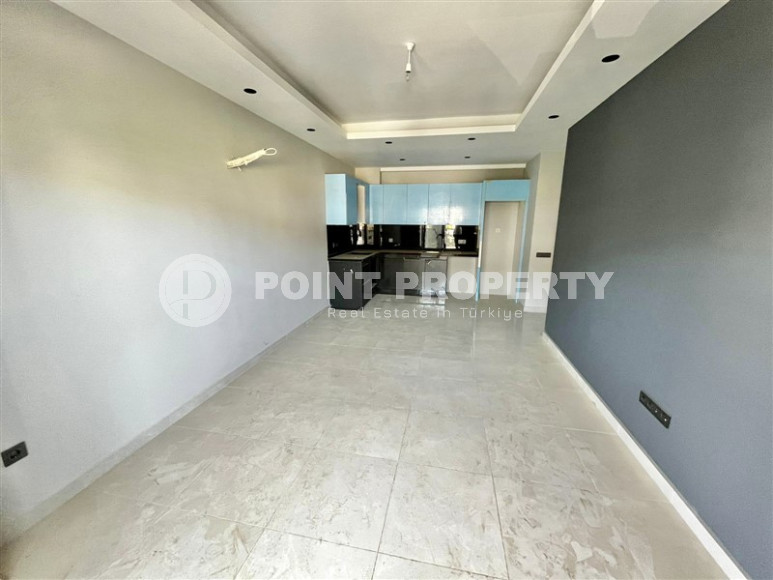 Cozy two-room apartment 1+1 with an area of 52 m2 in a modern residential complex with a private pool in Oba, Alanya-id-1202-photo-9