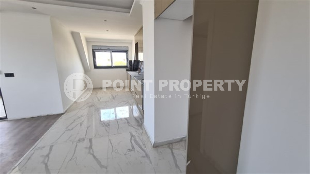 Three bedroom penthouse, 120m², in a residence in the final stage of construction in the Gazipasa area-id-2380-photo-8