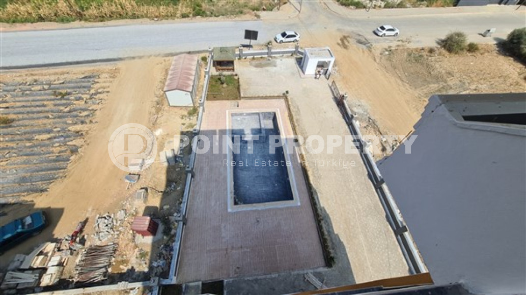 Three bedroom penthouse, 120m², in a residence in the final stage of construction in the Gazipasa area-id-2380-photo-12