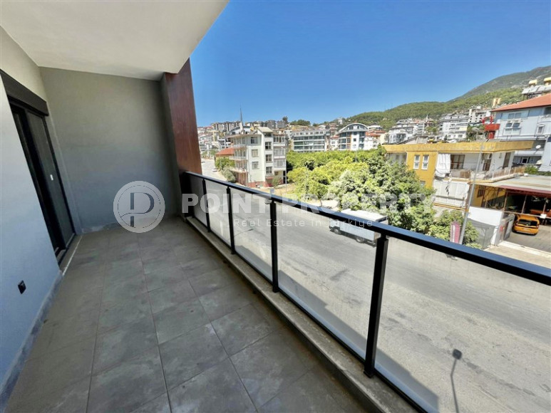 Cozy two-room apartment 1+1 with an area of 52 m2 in a modern residential complex with a private pool in Oba, Alanya-id-1202-photo-10