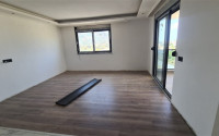Three bedroom penthouse, 120m², in a residence in the final stage of construction in the Gazipasa area-id-2380-photo-18