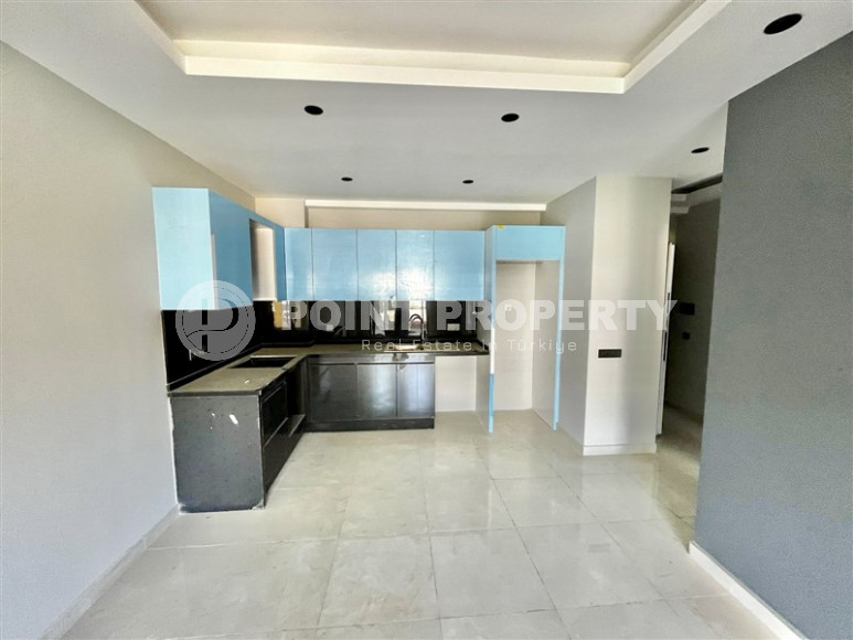 Cozy two-room apartment 1+1 with an area of 52 m2 in a modern residential complex with a private pool in Oba, Alanya-id-1202-photo-11