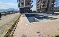 Three bedroom penthouse, 120m², in a residence in the final stage of construction in the Gazipasa area-id-2380-photo-28