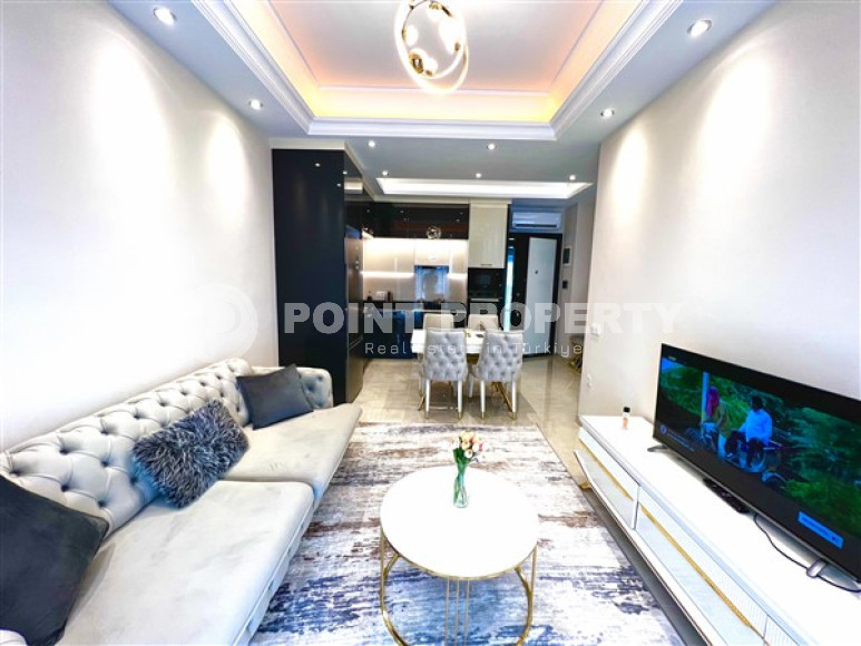 Меблированная двухкомнатная квартира, 65м², в новом элитном комплексе в Махмутларе, 650м до моря-id-2381-фото-2