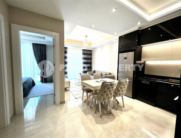 Меблированная двухкомнатная квартира, 65м², в новом элитном комплексе в Махмутларе, 650м до моря-id-2381-фото-4