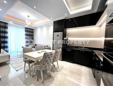 Меблированная двухкомнатная квартира, 65м², в новом элитном комплексе в Махмутларе, 650м до моря-id-2381-фото-5