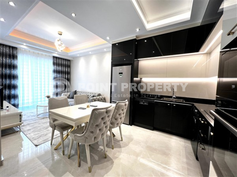 Меблированная двухкомнатная квартира, 65м², в новом элитном комплексе в Махмутларе, 650м до моря-id-2381-фото-5