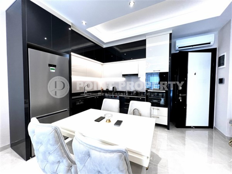 Меблированная двухкомнатная квартира, 65м², в новом элитном комплексе в Махмутларе, 650м до моря-id-2381-фото-6