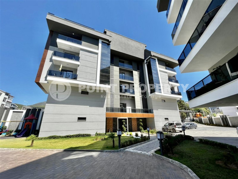 Cozy two-room apartment 1+1 with an area of 52 m2 in a modern residential complex with a private pool in Oba, Alanya-id-1202-photo-12