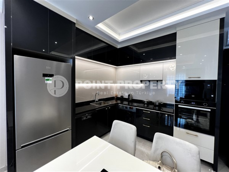 Меблированная двухкомнатная квартира, 65м², в новом элитном комплексе в Махмутларе, 650м до моря-id-2381-фото-7