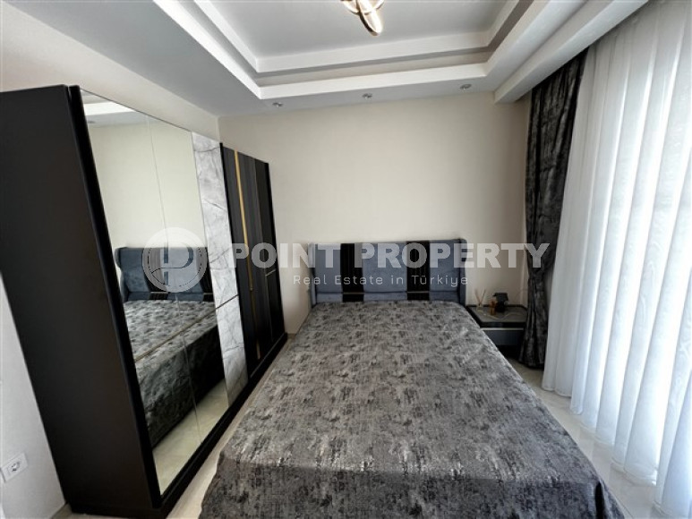 Меблированная двухкомнатная квартира, 65м², в новом элитном комплексе в Махмутларе, 650м до моря-id-2381-фото-10