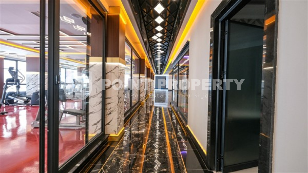 Меблированная двухкомнатная квартира, 65м², в новом элитном комплексе в Махмутларе, 650м до моря-id-2381-фото-17