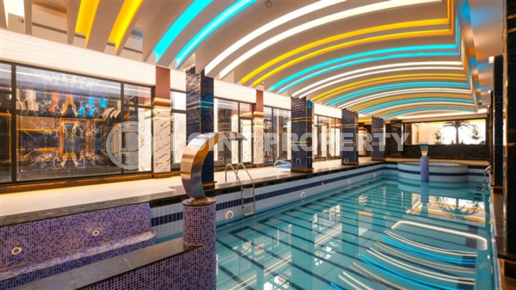 Меблированная двухкомнатная квартира, 65м², в новом элитном комплексе в Махмутларе, 650м до моря-id-2381-фото-31