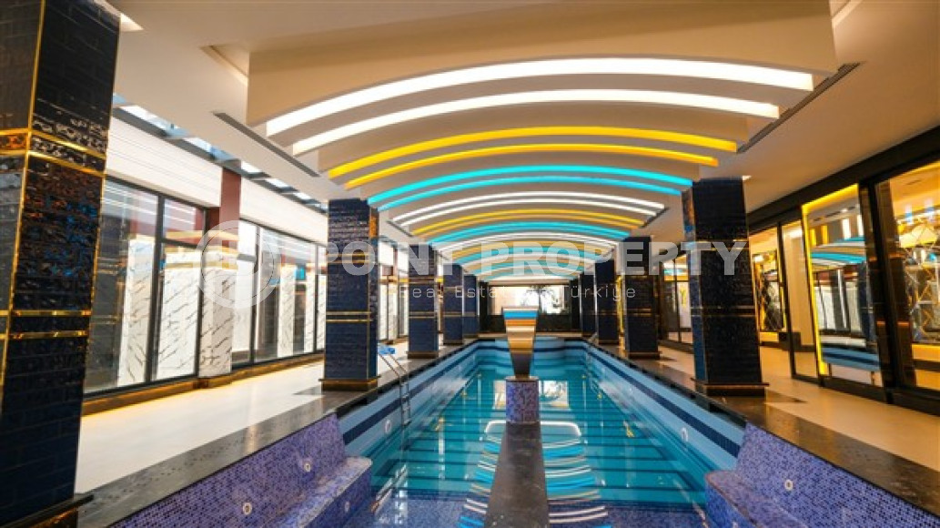 Меблированная двухкомнатная квартира, 65м², в новом элитном комплексе в Махмутларе, 650м до моря-id-2381-фото-33