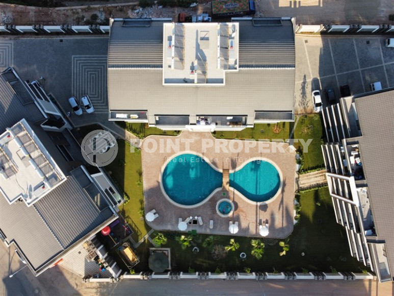 Cozy two-room apartment 1+1 with an area of 52 m2 in a modern residential complex with a private pool in Oba, Alanya-id-1202-photo-16