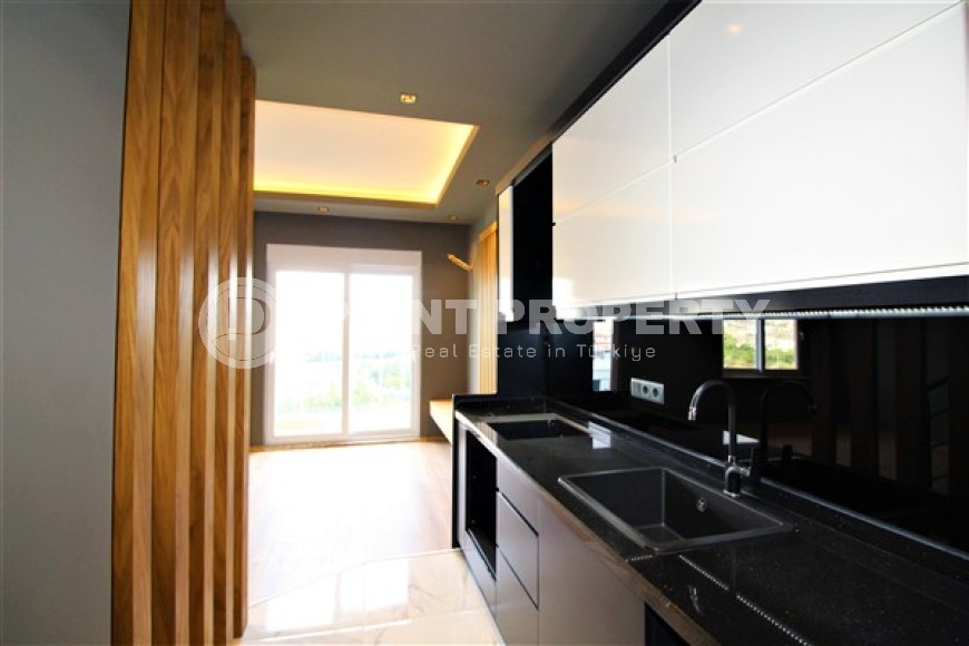 Апартаменты с двумя балконами и одной террасой, 95м2 в новом комплексе в районе Демирташ, Алания-id-2385-фото-4