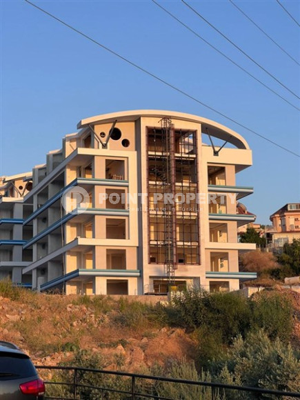 Квартира с одной спальней, 65м², в комплексе на этапе строительства в 800м от моря, Аланья, Каргыджак-id-2388-фото-14