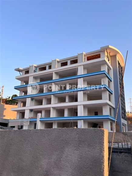 Квартира с одной спальней, 65м², в комплексе на этапе строительства в 800м от моря, Аланья, Каргыджак-id-2388-фото-18