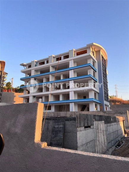 Квартира с одной спальней, 65м², в комплексе на этапе строительства в 800м от моря, Аланья, Каргыджак-id-2388-фото-19